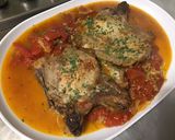 Une image de l'étape 11 de Côtes de porc aux tomates, ail rose et fanes de navets.