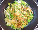 A picture of step 4 of Pajeon (spring onion pancakes).