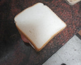 Foto del paso 2 de la receta: Sándwich de tomate, queso y jamón cocido