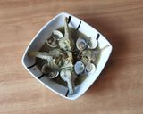 Foto del paso 7 de la receta Alcachofas con almejas en salsa verde