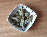 Foto del paso 7 de la receta: Alcachofas con almejas en salsa verde
