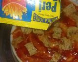 A picture of step 2 of Peri peri chicken Pizza.