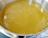 Foto del paso 7 de la receta Caldo con carcasas de pollo y surtido de verduras para cocido –en olla rápida–