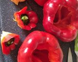 A picture of step 1 of Bajoques Farcides Agres (Stuffed Peppers with Rice and Sausage).