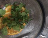 A picture of step 1 of Orange crush cocktail🍸.