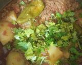 A picture of step 6 of Aloo qeema.
