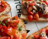 A picture of step 6 of Amalfi Bruschetta with Sardines, Piccolo Tomatoes & Basil.