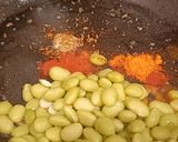 A picture of step 1 of Masala Edmame (Stir Fried green soy beans).