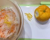 A picture of step 10 of Kouhaku Namasu (Daikon and carrot pickles).
