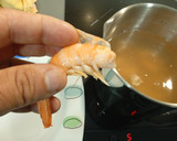 Foto del paso 1 de la receta: Calamares rellenos de arroz y langostinos