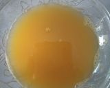 A picture of step 2 of Orange & ginger Detox drinks.