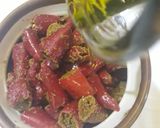 A picture of step 8 of Red chillies pickle.