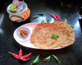 A picture of step 8 of Achari laccha paratha.