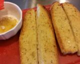 A picture of step 6 of Grilled Sausage and Cannellini Beans Puttanesca w/ Garlic Bread.