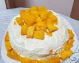 A picture of step 8 of Mango crêpe cake.