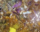 A picture of step 1 of Twist macaroni jollof.