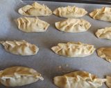 Foto del paso 3 de la receta: Empanadas de morcilla con queso feta y cebollino