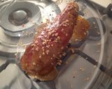 Foto del passaggio 6 della ricetta Filetto di maiale laccato al miele e nocciole con peperoni corno
