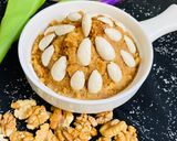 A picture of step 7 of Injeer & Suji Halwa with walnuts 💖.