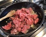 Une image de l'étape 5 de Porc aux tomates séchées, ail mariné, oignon et épices italiennes.