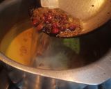 A picture of step 13 of Pakora Curry.