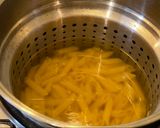 A picture of step 1 of Penne al'arrabiata (pasta with a spicy tomato sauce).