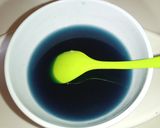 A picture of step 3 of Homemade Blue Curacao syrup.
