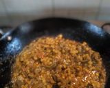 A picture of step 3 of Chana dal karela.