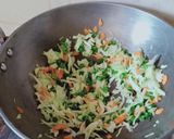 A picture of step 2 of Cheesy schezwan Maggi.