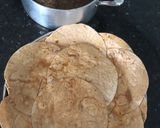 A picture of step 4 of Baked Mussakhan on bread.