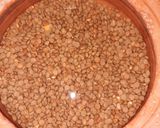 A picture of step 1 of Masoor Pulao.