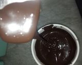 A picture of step 1 of 1 bite chocolatey marshmallow pops.