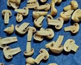 A picture of step 1 of Straw mushroom pickle.
