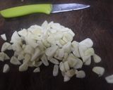 Foto del paso 2 de la receta Chipirones y mejillones al ajillo
