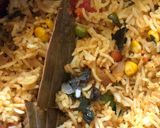 A picture of step 10 of Mix Vegetable pulav and pomegranate Raita.