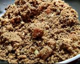 A picture of step 5 of Wheat flour seeds and nuts Ladoo with leftover ghee residue.