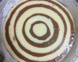 A picture of step 10 of Zebra Cake.