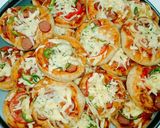 صورة لخطوة 3 من وصفة مينى بيتزا 🍕