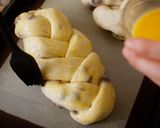 A picture of step 14 of Soft Chewy Braided Raisin Bread.