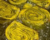 A picture of step 9 of Authentic Rickwach with Urad Dal and Colocasia leaves.