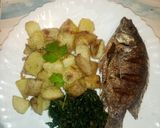 A picture of step 10 of Onion fried potatoes with fish and greens.