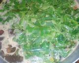 A picture of step 4 of Jollof rice with moringa.