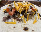 A picture of step 10 of Beef and Black Bean Crunch Burritos.