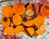 A picture of step 1 of Honey-Baked Persimmons with Star anise and Cinnamon:.