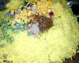 A picture of step 7 of Pineapple Fried Rice with peppered chicken and fried plantain.