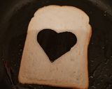 A picture of step 3 of Bread Omelette and chips.