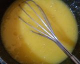 A picture of step 5 of Kunafa and Qashtalia Decorated with Oranges, Strawberries, and Bananas.
