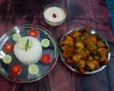 A picture of step 29 of Aloo fulcopi katla rosha ar misti doi.