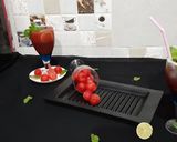 A picture of step 3 of Watermelon Mojito with blue Curacao.