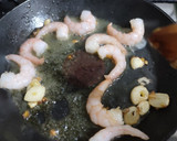 Foto del paso 2 de la receta: Camarones al pil pil (con ají verde)